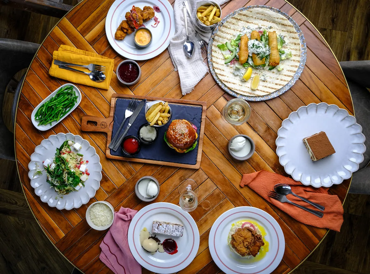 plates of food on restaurant table